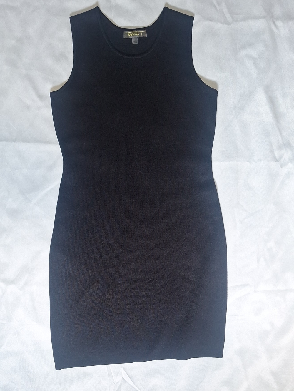 Black Sleeveless Knit Mini Dress — Sleek Bodycon Style
